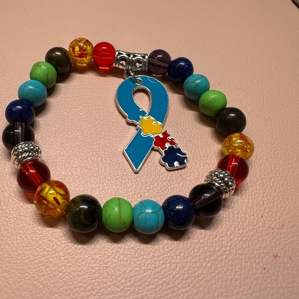 Autism Support Bracelet. Colorful Beaded Bracelet with Puzzle Ribbon Charm